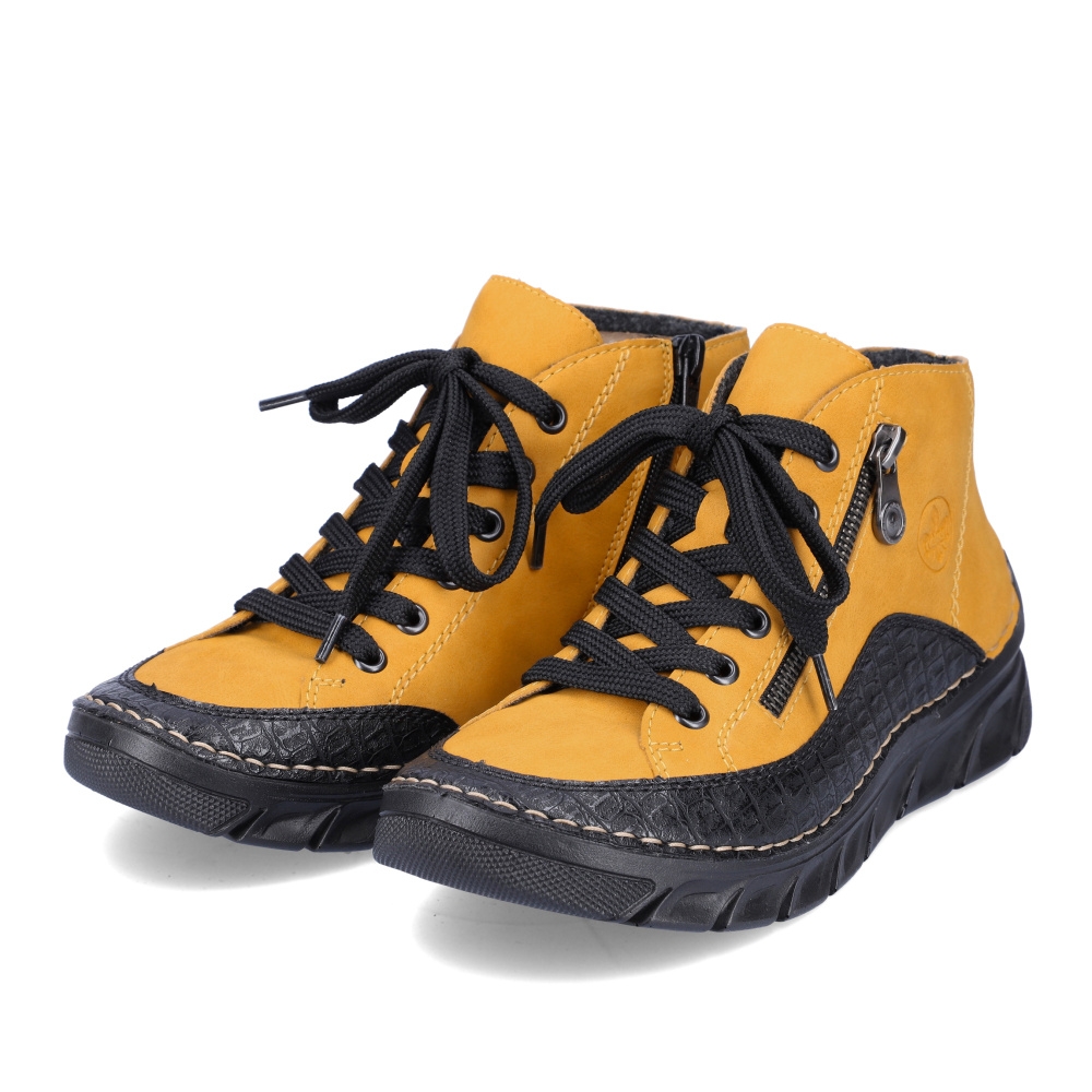 detail Dámská kotníková obuv RIEKER 55021-68 žlutá W2